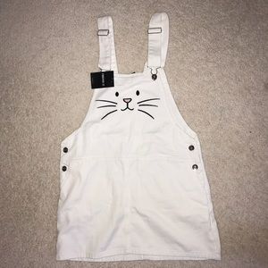 White overall dress with bunny